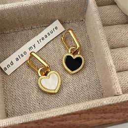 Black and white double-sided love lock earrings French high-end fashion commuter earrings Exquisite versatile earrings