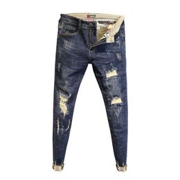 Whole 2020 Fashion No ironing low waist washing edge pants slim feet pants men's spring ripped holes ankle length jeans282C
