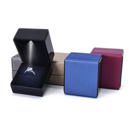 Packing Boxes Wholesale Leather Jewellery Box With Led Light For Engagement Rings Festival Birthday Ring Display Gift W0024 Drop Deliver Dh3Qe