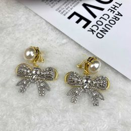 Top designer MiuMiu Fashion Earrings New Gold Bowknot Pearl French Light Luxury Exaggerated Temperament Fairy Silver Needle Earrings gifts Jewelry Accessories