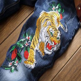 2020 popular New embroidered tiger flower jeans causal slim straight beggar pants Chinese style zipper flyer pattern trousers324C