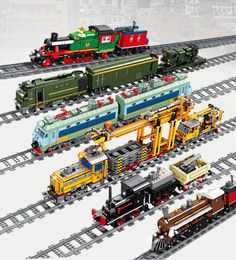 طرازات طراز قطار بناء مجموعات القطارات الكهربائية طقم بناء اللبنات ألعاب السكك الحديدية الميكانيكية تراي سكة حديد سيارة DIY ألعاب للأطفال هدايا عيد الميلاد