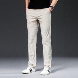 Men's Pants TFETTERS 2023 Spring Summer Breathable Solid Colour Plus Size 42 Trousers Mid Straight Loose Black Men 230822