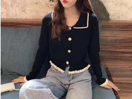 Womens Sweaters AutumnWinter Long Sleeves Wooden Ear Edge Cardigan Knitted Tshirt Design Sense Small Polo Neck Short Top 230822
