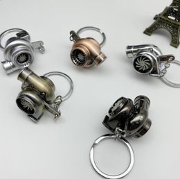 Keychains 50pcs/lot Double Sides Turbine Key Chain Car Twin Turbo Keychain Spinning Ring Keyring Wholesale Mixorder