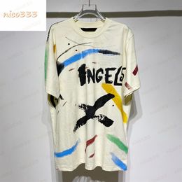 23ss New t shirt hand painted graffiti letters printed pattern cotton round neck loose versatile street men women short sleeved2412