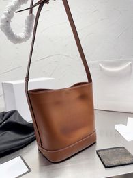 Bucket bag, the first choice for cool girls. Equipped with card bag and adjustable leather shoulder strap