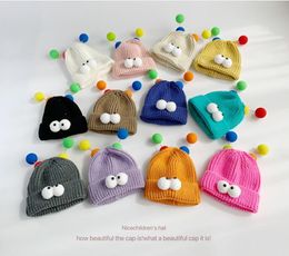 Cartoon big eyes woolen hat autumn and winter new knitted hat multi-color winter windproof ear warm hat