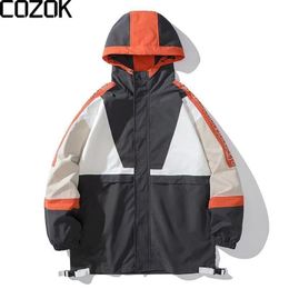 Mens Jackets College Patchwork Hooded Waterproof Windbreakers Women Oversize Sports Jacket Spring Thin Vintage Cargo 230825