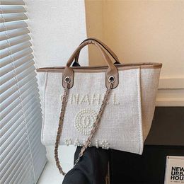 2023 New Little Fresh Ladies Style Handbag Tote Bag Pearl Beaded Letter Decorative Women's Bag ins 70% Designer Outlet Sale