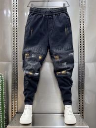 Men's Jeans Street Hip Hop Jeans Men Grid Stitching Harem Sweatpants in Designer Brand Stackes Loose Cowboy Pants Fashion Clothing 230825
