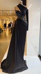 2023 Black Mermaid Evening Dresses Wear One Shoulder Crystal Beads Prom Gowns Long Sleeves Side Split Formal Prom Dress