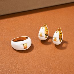 Gold Embossed White Enamel Ring European and American Advanced Light Luxury and Simplicity Fashion Temperament Ear Clip Earrings for Women