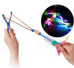 Led Flash Elastic Slingshot Toy Gift Light Up Rotating Flying Arrow Rocket Helicopter LED toy for party Festival Gift