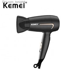 Kemei Professional Hair Dryer Portable Foldable Handle Compact 1800W Blow Dryer Hot Wind Low Noise Home Appliance Styling Tools Q230828