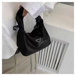 13% OFF Bag 2024 New Launch Designer HandbagStyle fashionable nylon cloth triangle label basket black