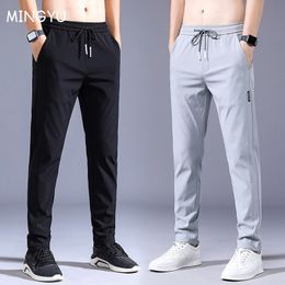 Men's Pants Summer Men's Casual Pants Thin Soft Elasticity Lace-up Waist Solid Colour Pocket Applique Korea Grey Black Work Trousers Male 38 230828