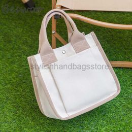 Totes New Spring 2023 Women's Simple Canvas Bag Large Capacity Shopping Bag Waterproof Travel Handbag Multi Pocket Handbagstylishhandbagsstore