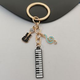 Keychains Lanyards Cute Enamel Musical Instruments Keychain Note Keyboard Guitar Key Ring Music Chains For Artist Gifts DIY Handmade Jewelry 230831