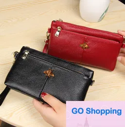 First Layer Women's Leather Handbag European and American Retro Fashion Minimalism Long Wallet Long Leather Wrist Cell Phone Bag Wholesale