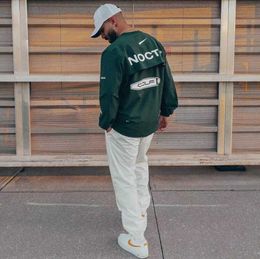 Con cappuccio maschile versione statunitense Nocta Golf Co Drano marcata con marchio traspirante per asciugatura rapida Sport Sport Sports a manica lunga estate