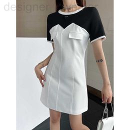 same paragraphKim Kardashianesigner same paragraph spring and summer new black white color contrast dress with triangle decoration on the chest slim fitting