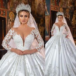 2023 Luxury A Line Wedding Dresses Jewel Neck Illusion Lace Appliqued Long Sleeves Crystal Beads Bridal Gowns Custom Made Robe De Mariee Ball Gown
