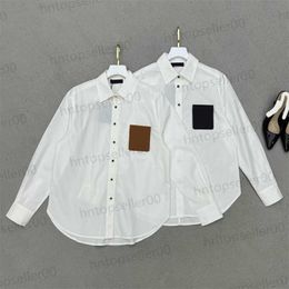 Womens Designer Blouse Spring Summer Fashion Casual Loose Fitting White Long Sleeved Shirt Old Flower Leather Pocket Lapel Custom Cotton Material