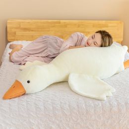 The big white goose comforts the girl with a pillow, sleeps with legs, pillows, plush toys, velvet cushions, children's gifts