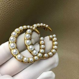 60% OFF 2023 New Luxury High Quality Fashion Jewellery for New double pearl brooch brass material small crowd design fashionable and versatile suit pin
