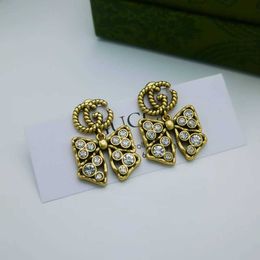 Fashion Collection 2023 New Luxury High Quality Fashion Jewellery for Light luxury classic old diamond inlaid bow ancient family design double earrings