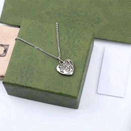 20% DI SCONTO 2023 Nuovi gioielli di moda di alta qualità di lusso per collana di coppia versatile hip-hop con testa di tigre in argento sterling Love Fearless Flying Bird Heart