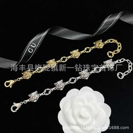 Design luxury jewelry gold and two-color old head bracelet with letters women to enjoy Year of the