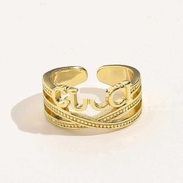 Design luxury jewelry Wide brass plated real gold female ancient family hollow hand decoration simple index finger ring