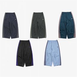 Mens Pants 5 Colours Wide Hem Needles Sweatpants Men Women 1 1 High Quality AWGE Leg Trousers Embroidery Butterfly Striped Ribbon 230307