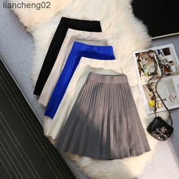 Skirts Autumn Winter Knitted Pleated Skirts Women's Elastic High Waist A-Line Umbrella Skirts Casual Sexy Slim Short Mini Skirts W0308