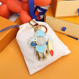 3 Colors Luxury Designer Keychain Stylish Sun-flower Image Pendant Keychains Trendy Keys Buckle Mens Womens Bag Ornaments High Qua192o