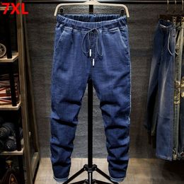 Men's Jeans Large size jeans black men's man plus size harem pants autumn elastic stretch Slim feet trousers 7XL 6XL 5XL 230308