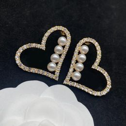 Rhinestone heart stud Luxurious earrings. Large, perfect swarovski pearls. Very nice looking designer earrings. High quality valentine's day gift aretes Jewellery