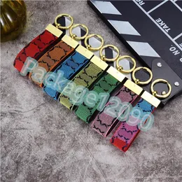 2023 Designer Multicolor Bee Buckle carbon fiber keychain for Men and Women - Handmade Leather Pendant Accessory for Car Keys and Bags