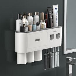 Toothbrush Holders Bathroom Magnetic Adsorption Inverted Holder Wall Automatic Toothpaste Squeezer Storage Rack Accessories 230308