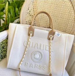 Designer Classic Evening Bags Luxury Handbag Fashion Pearl Brand Label Backpack Womens Beach Handbags Purse Women Canvas Hand Bag Ladies H00230916