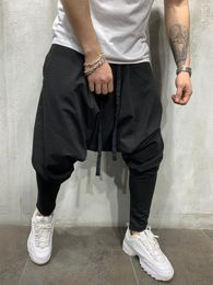 Mens Pants Mens Clothing Mens Hiphop Trend Trousers European American Loose Solid Colour Feet Street Sports Casual Harem Pants 230313