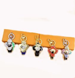 2022 Latest style key chain fashion men039s and women039s Jewellery Car key chain inlaid with crystal diamond fashion clutch p9193538