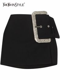 Skirts TWOTWINSTYLE Black Patchwork Diamond Skirt For Women High Waist Irregular Hem Solid Mini Female Summer Clothing Style 230313