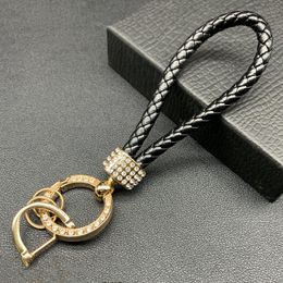 Mobile Phone Charms Braided leather rope car key ring wholesale high-grade zinc alloy key ring hanging ornaments