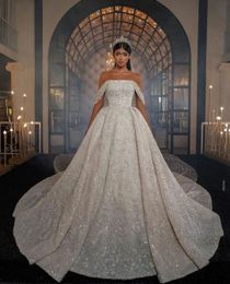 Luxury Ball Gown Wedding Dresses Bateau Sleeveless Off Shoulder Sequins Appliques Beaded Floor Length Ruffles 3D Lace Bridal Gowns Plus Size Vestido de novia