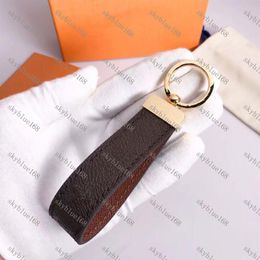 Fashion keychain classic unisex key chain real leather with stainless steel keychain keyring in Golden with brown with box L89761271l