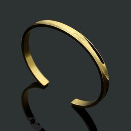 Designer gold Bangle women stainless steel knotted glossy couple bracelets men's fashion