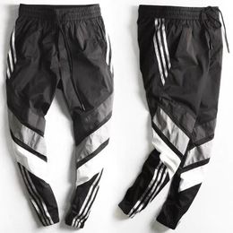 Men's Pants Spring Summer Sports Men Tooling Male Beam Feet Youth Version Closing Nine Points Casual Pant 230317